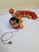 Vintage pulling toy, "centipede", 82 cm, made in Switzerland
