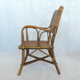 Small child vintage armchair in rattan