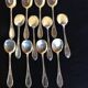 12 silver metal spoons, ice spoons