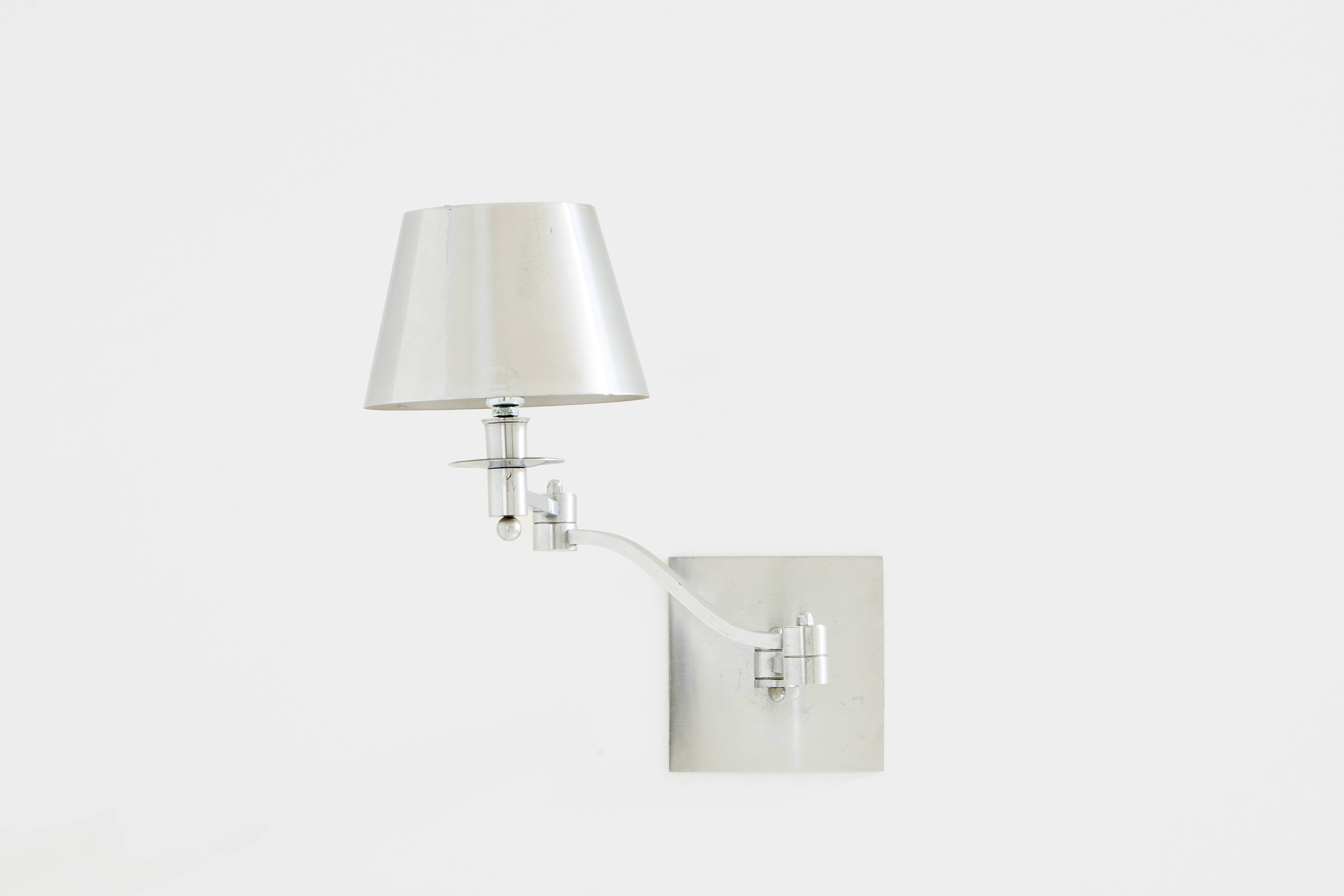 Maison Charles adjustable wall light, brushed steel, circa 1960