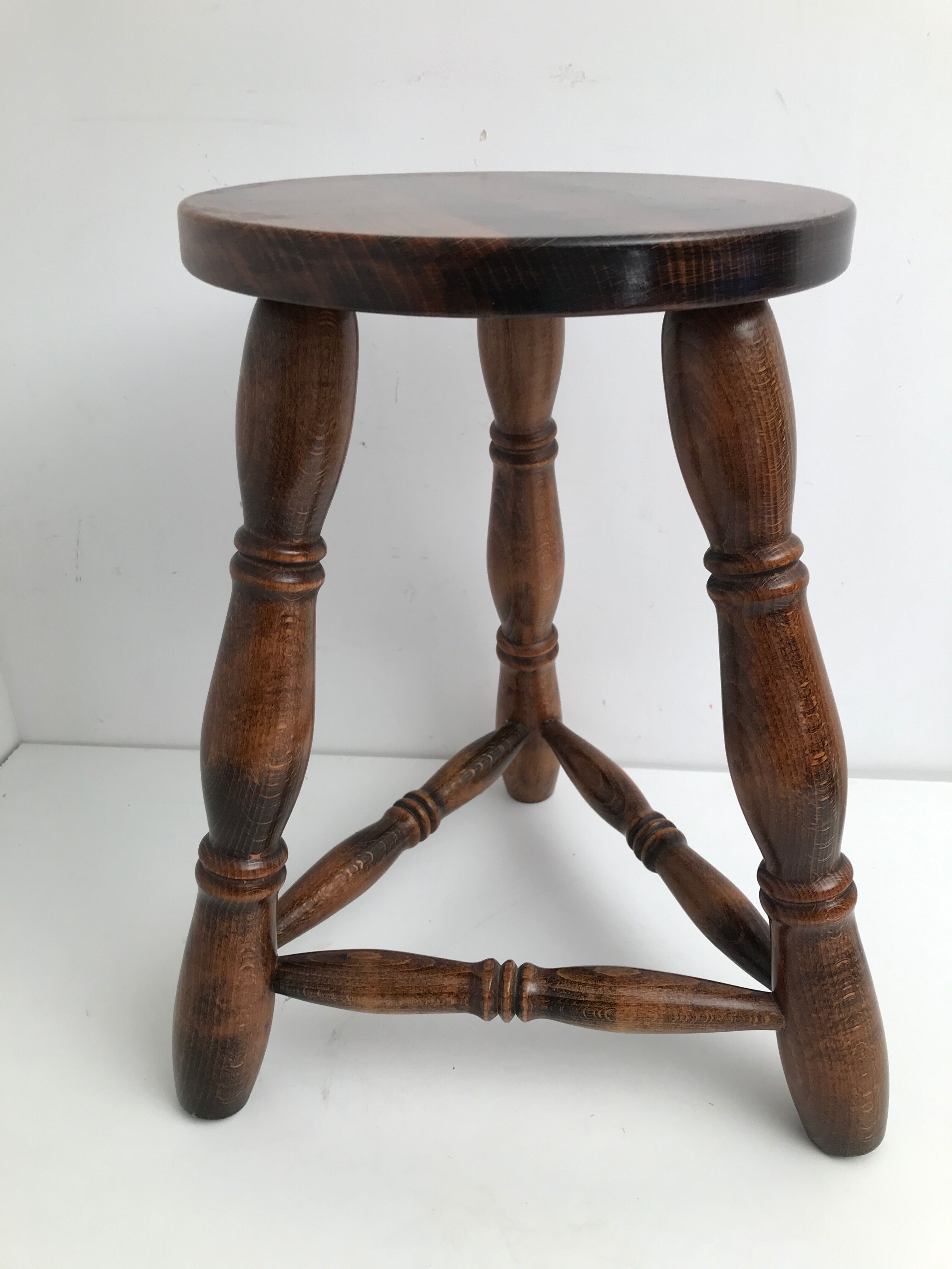 Wooden stool tripod foot