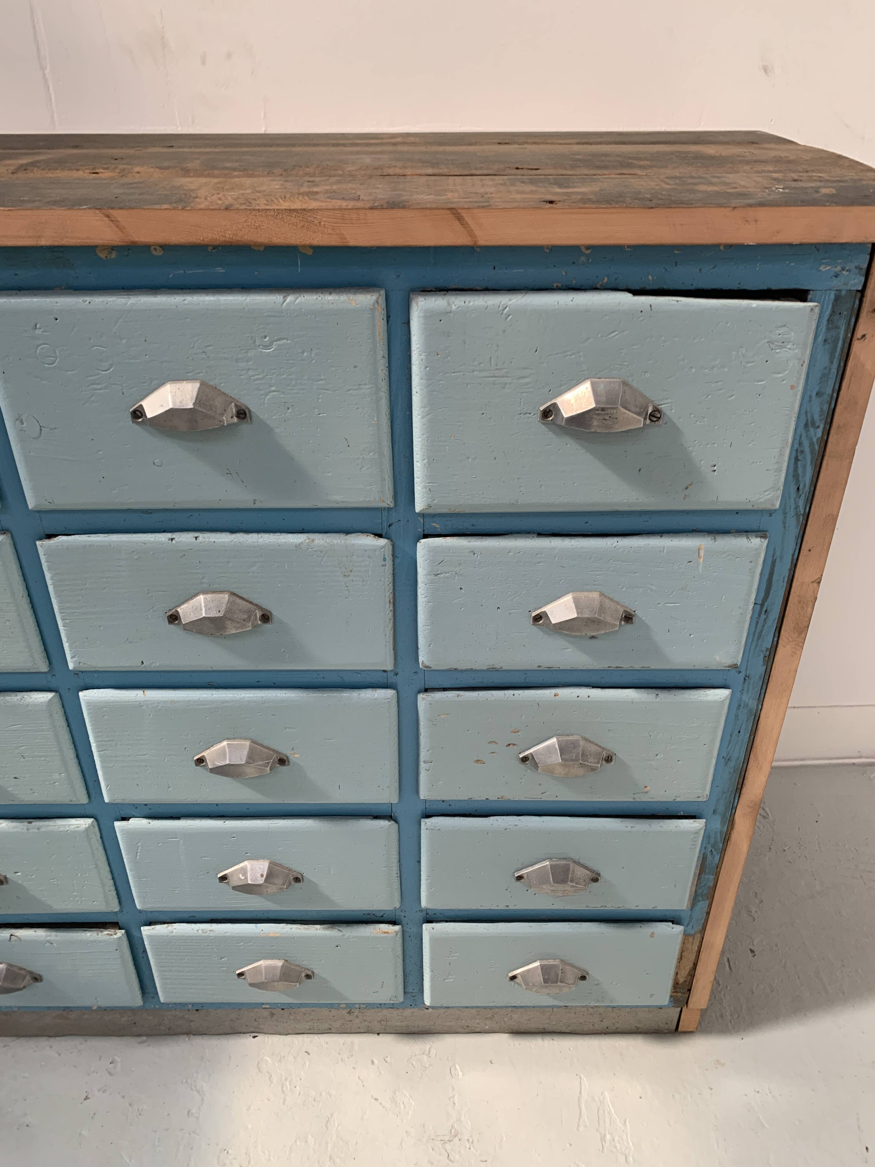 30-drawer storage unit in patinated fir, 20th century