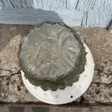 Art Deco ceiling light with a porcelain base.