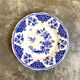 Round and hollow gien dish in white and blue enamelled earthenware