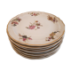 Set of porcelain dessert plates with flower patterns