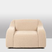A pair of large and comfortable beige fabric armchairs. Contemporary.