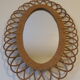 Vintage rattan mirror 60s 70s oval in rosette