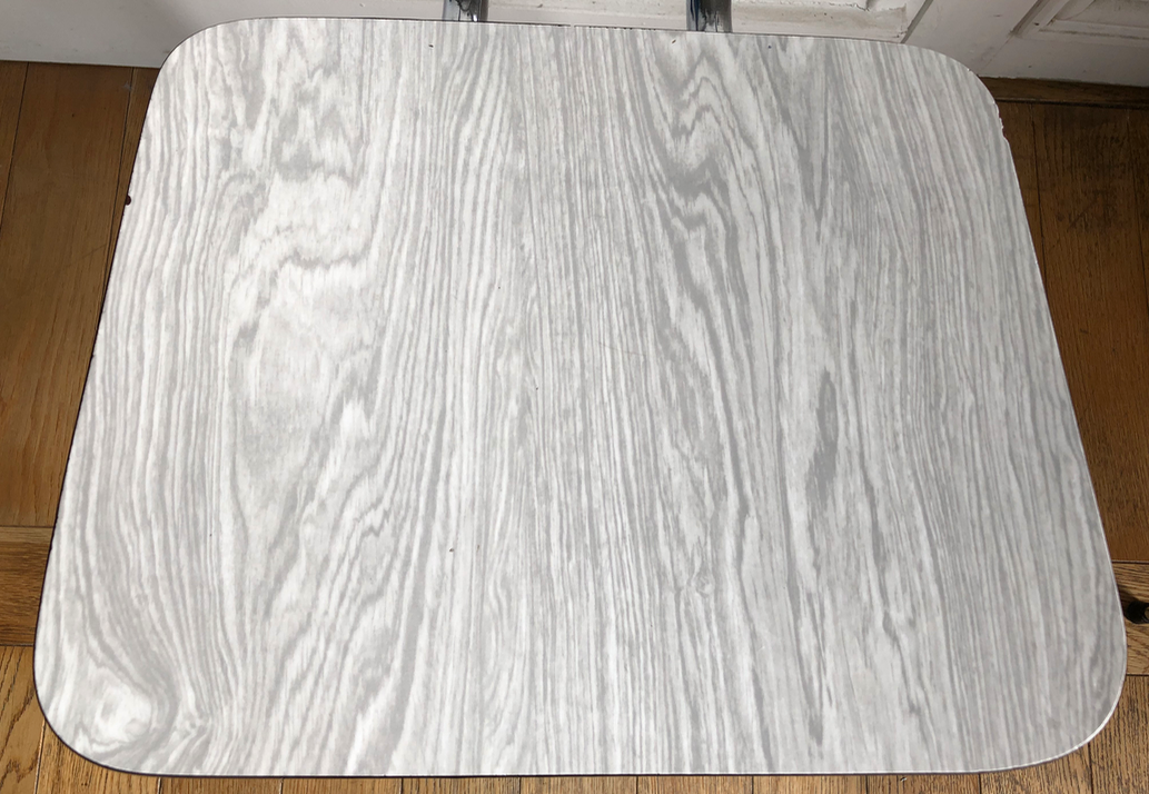 White and grey Formica chairs