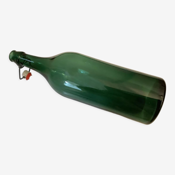 Xxl vintage bottle in green glass