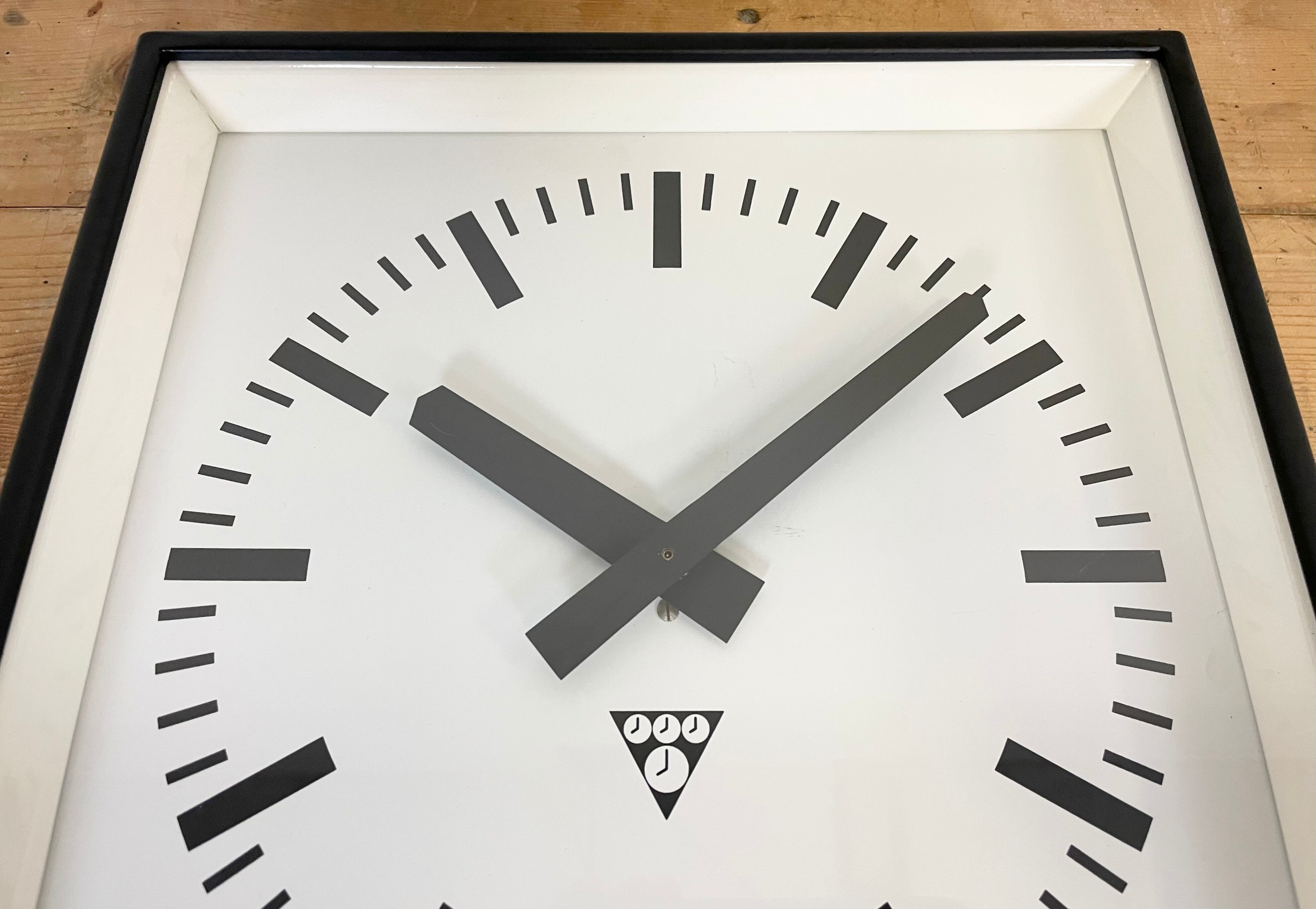 Black Industrial Square Wall Clock from Pragotron, 1970s