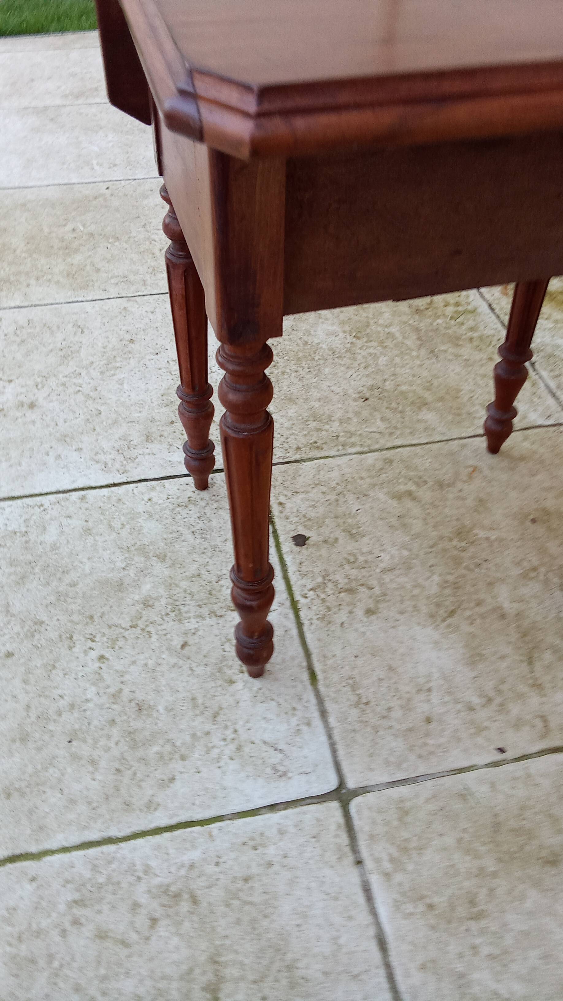 Antique small drop-leaf table from the 19th century.