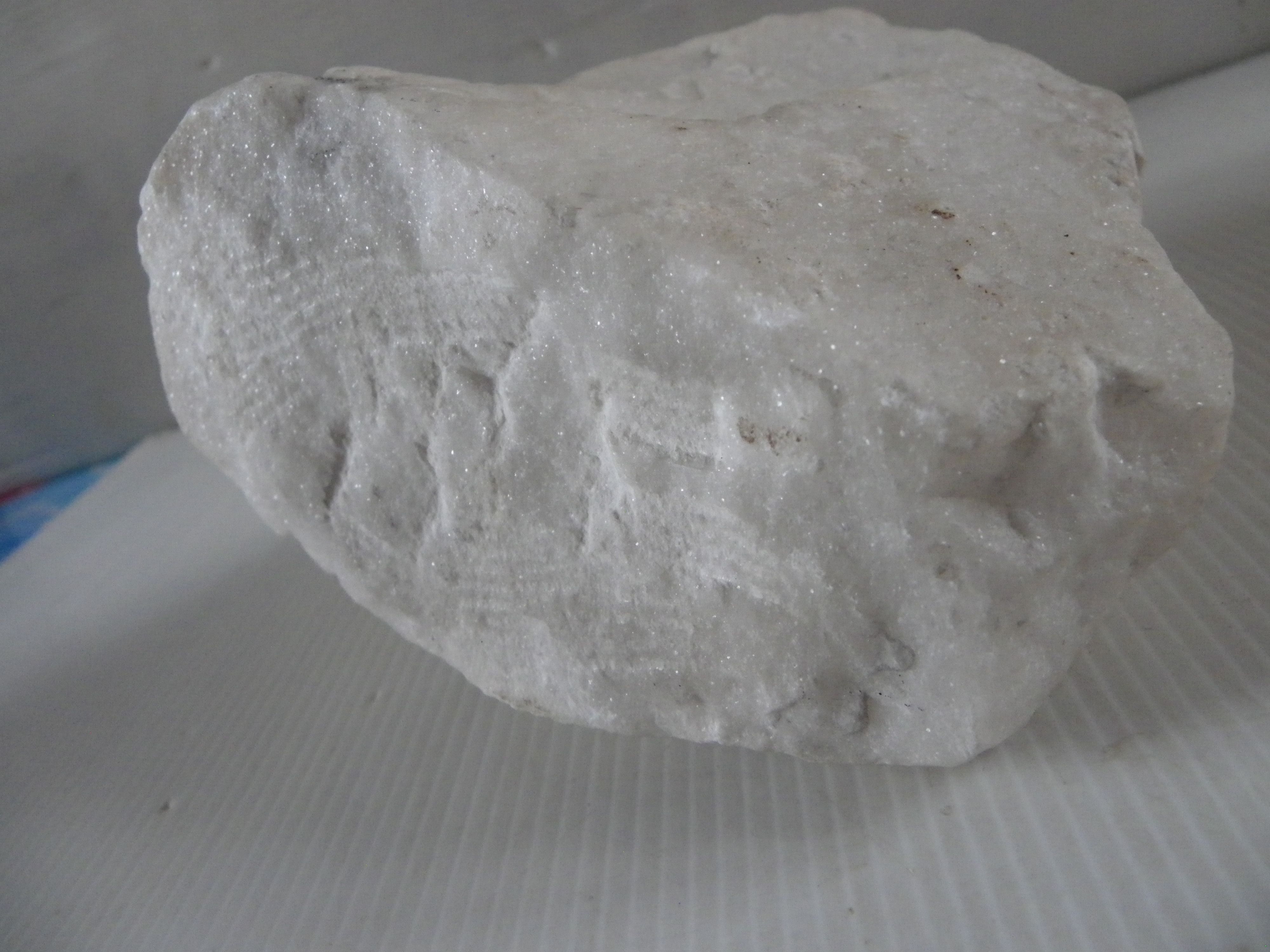 Sculpture face of woman in marble block 13 x 12 x 8 cm