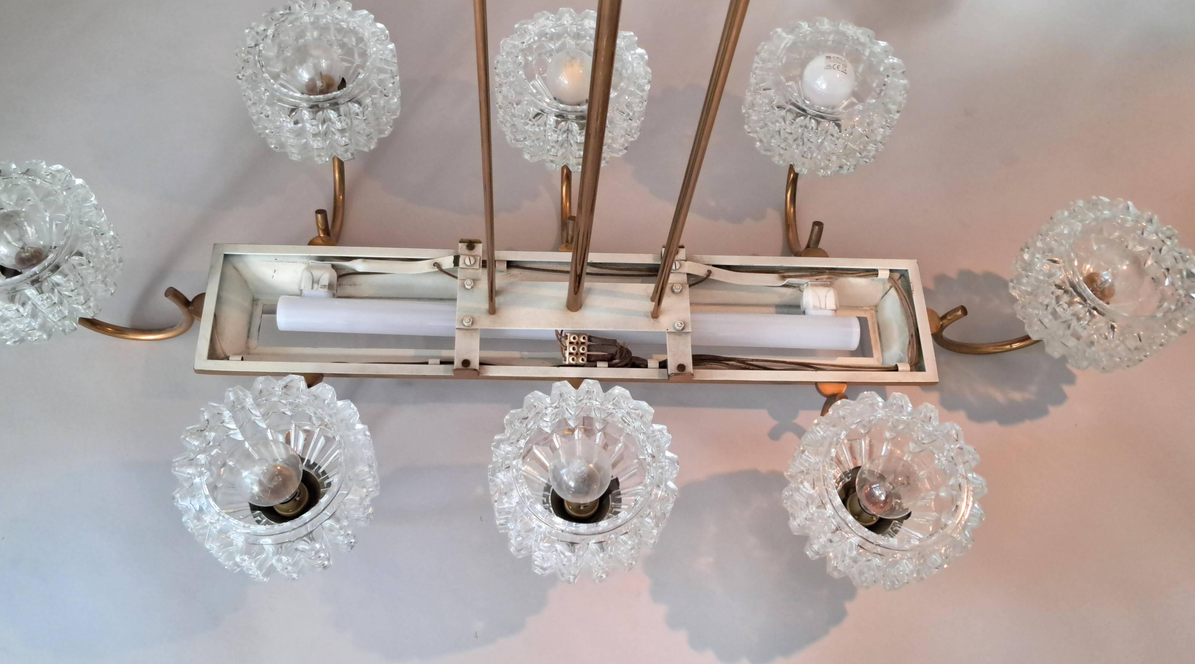 Eight-light chandelier in gilded brass and blue, 1950.