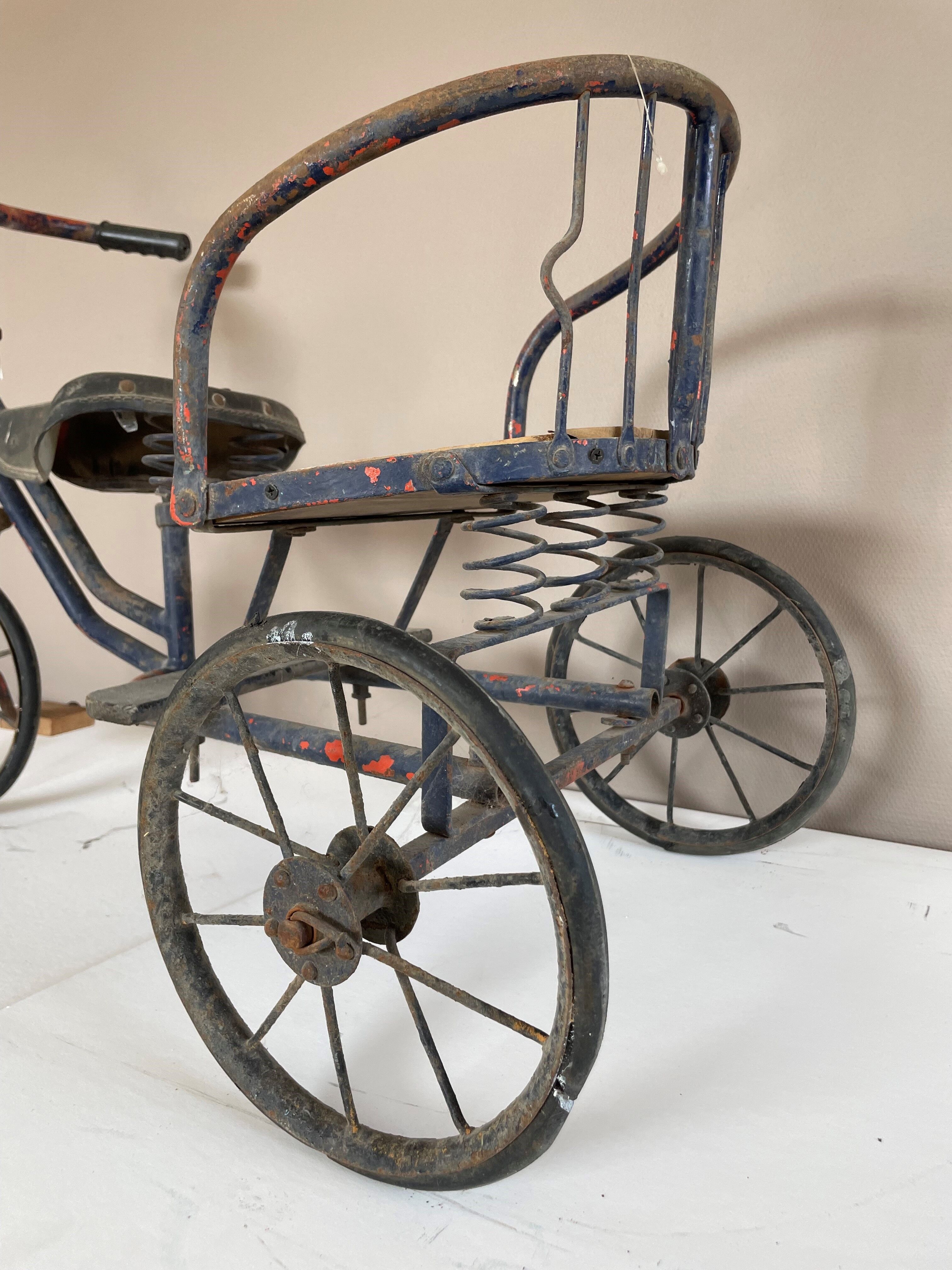 Vintage two-seater antique tricycle