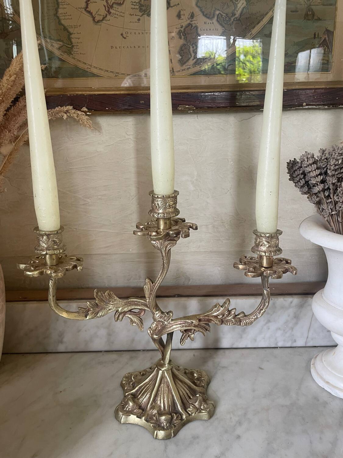 Old gilded bronze candlestick