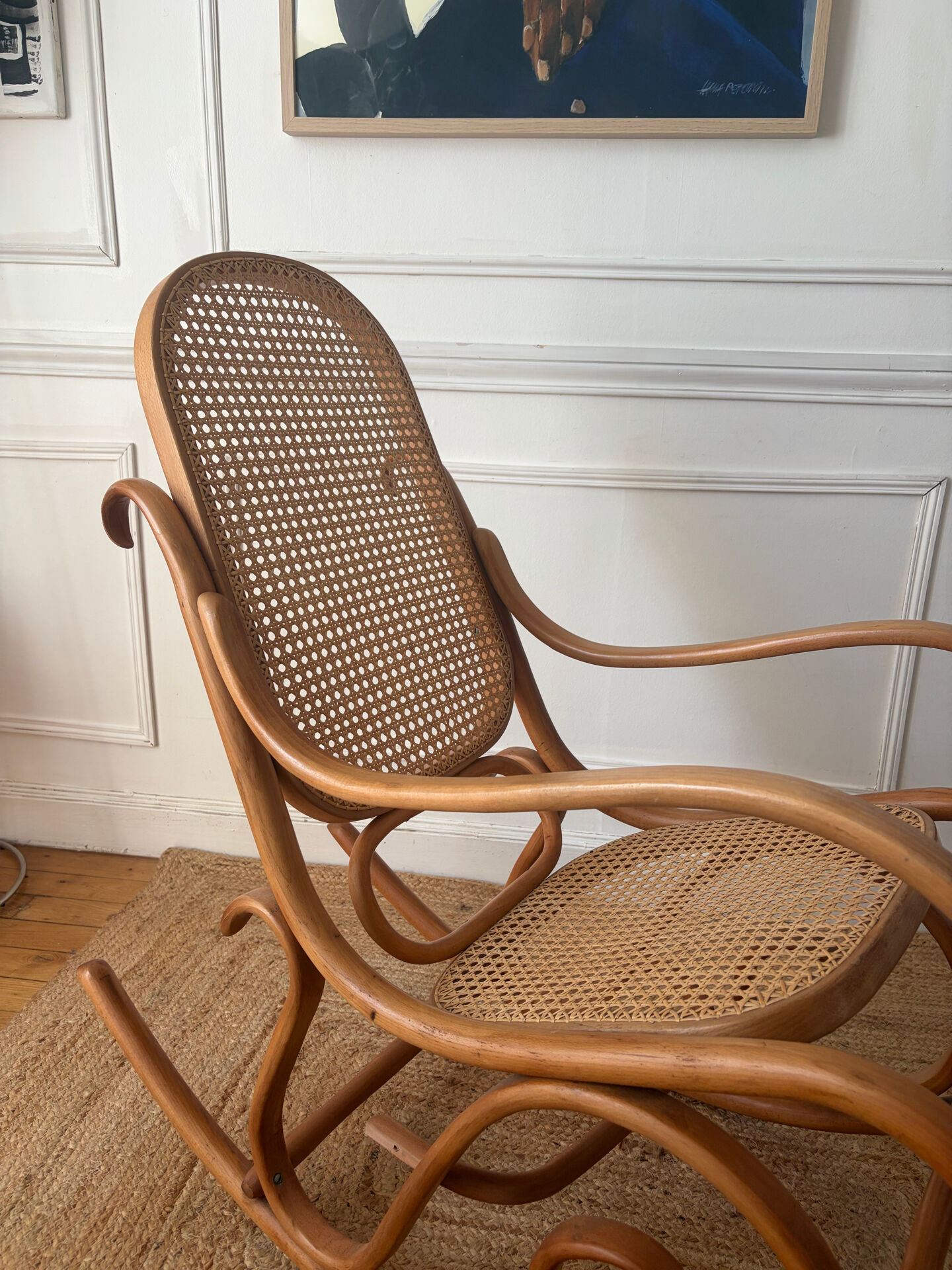 Curved wooden rocking chair
