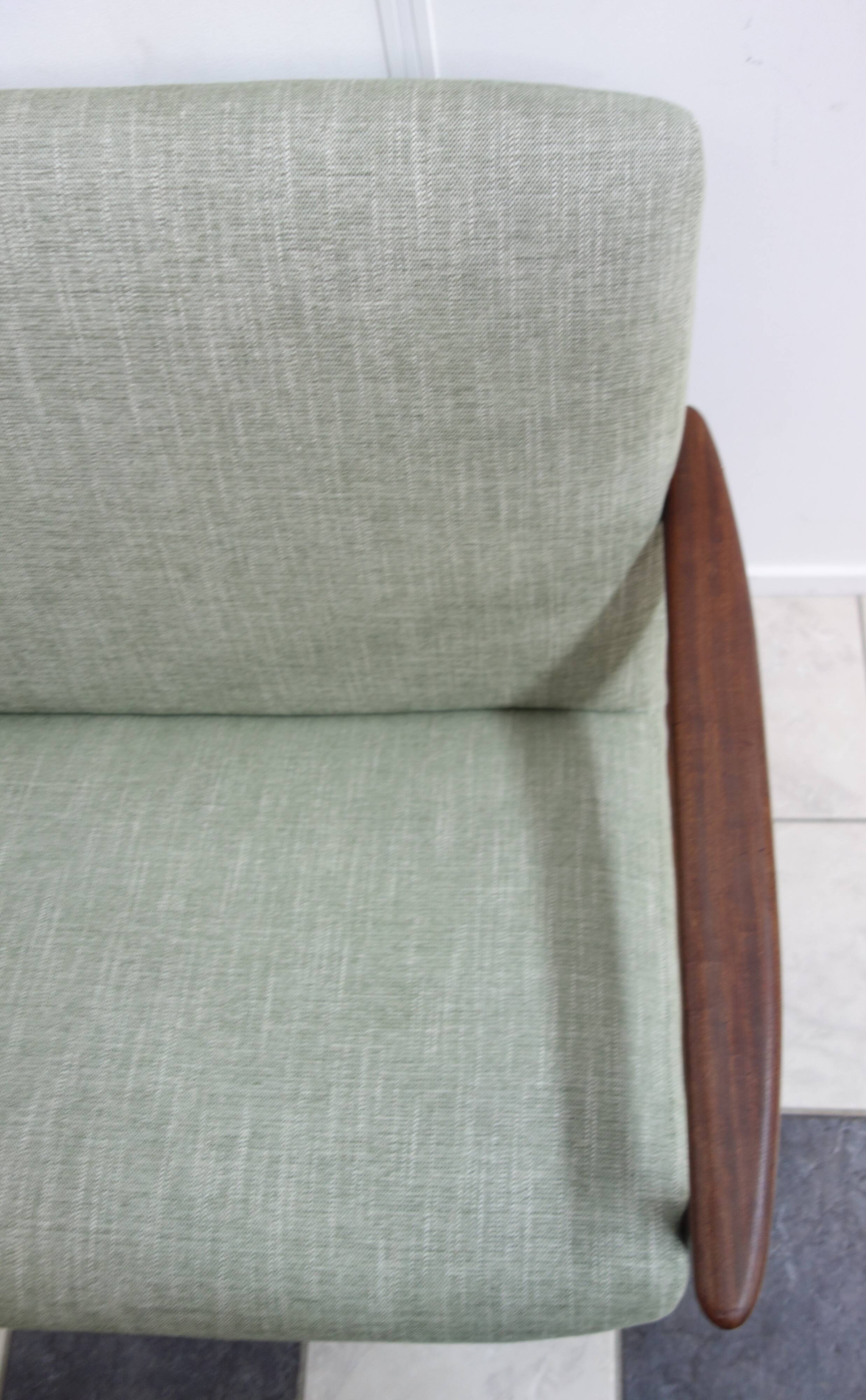 Danish teak 2 seat sofa green upholstery