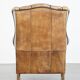 Sheep leather wingback chair finished with black piping