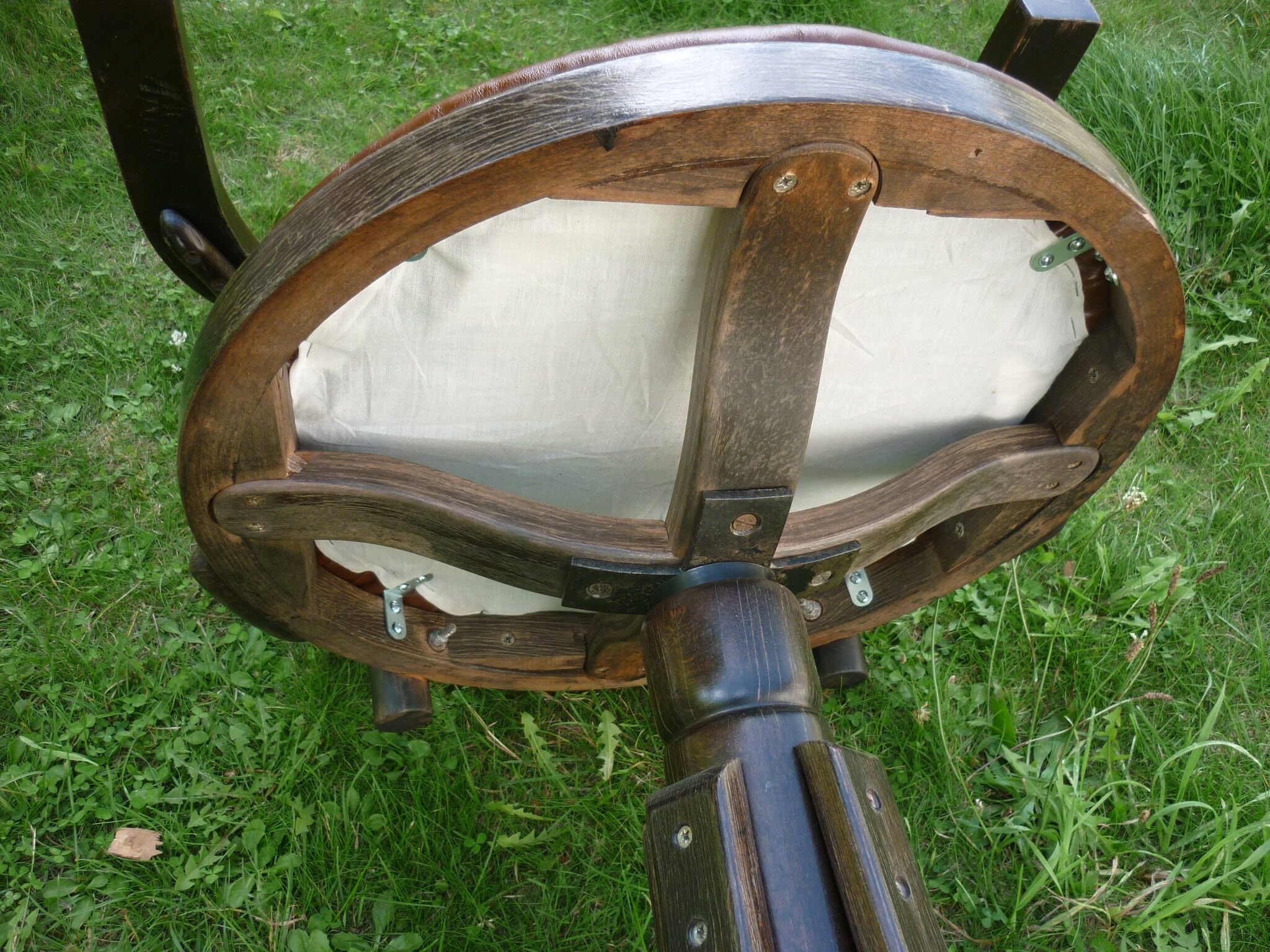 Swivel leather armchair