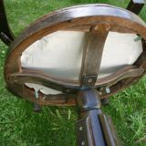 Swivel leather armchair