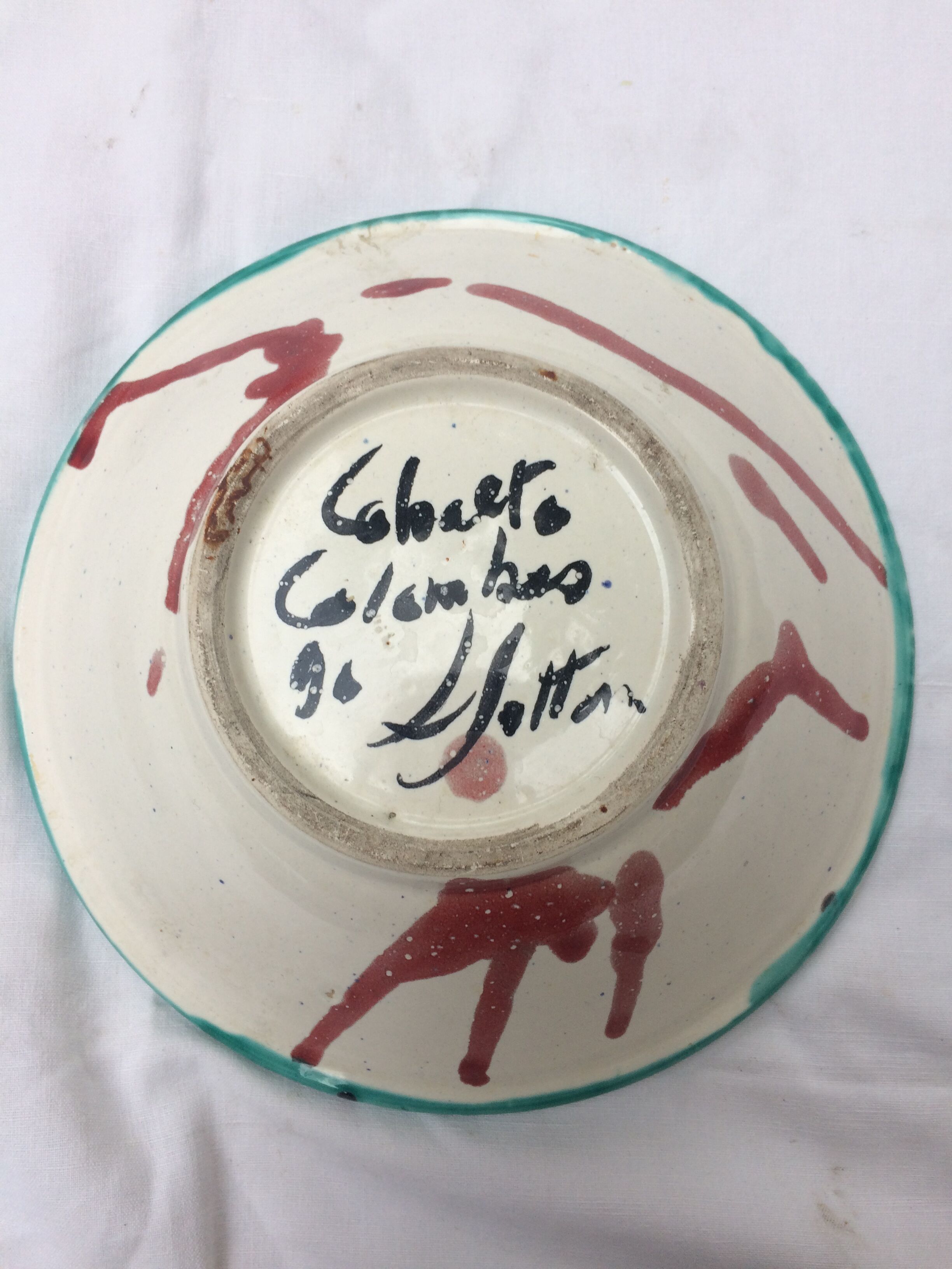 Ceramic plate decorated with a face