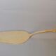 Gold-plated pie shovel
