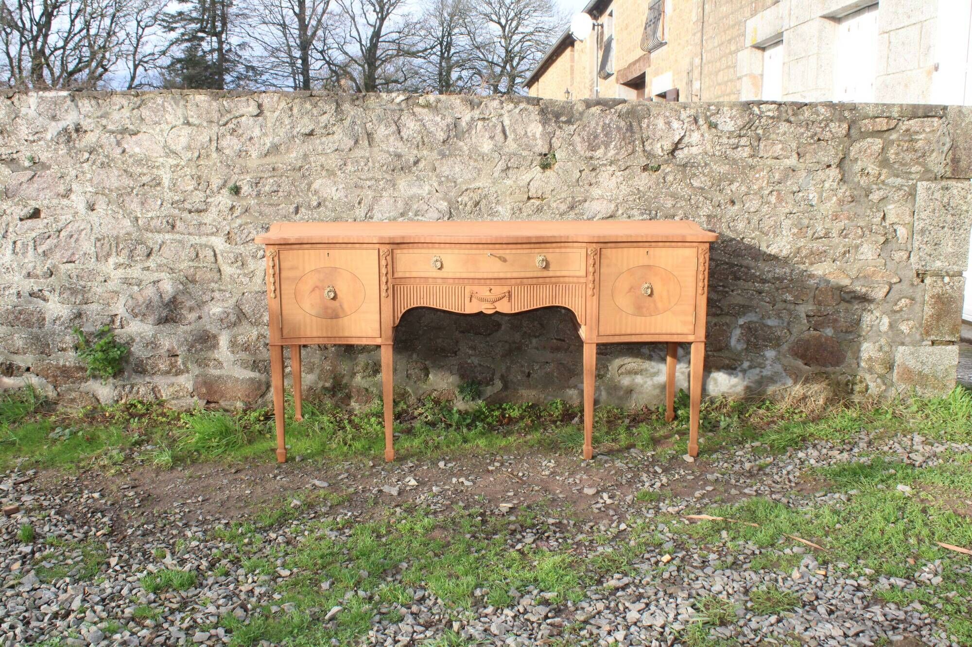English-made enfilade in Louis XVI style with light wood veneers.