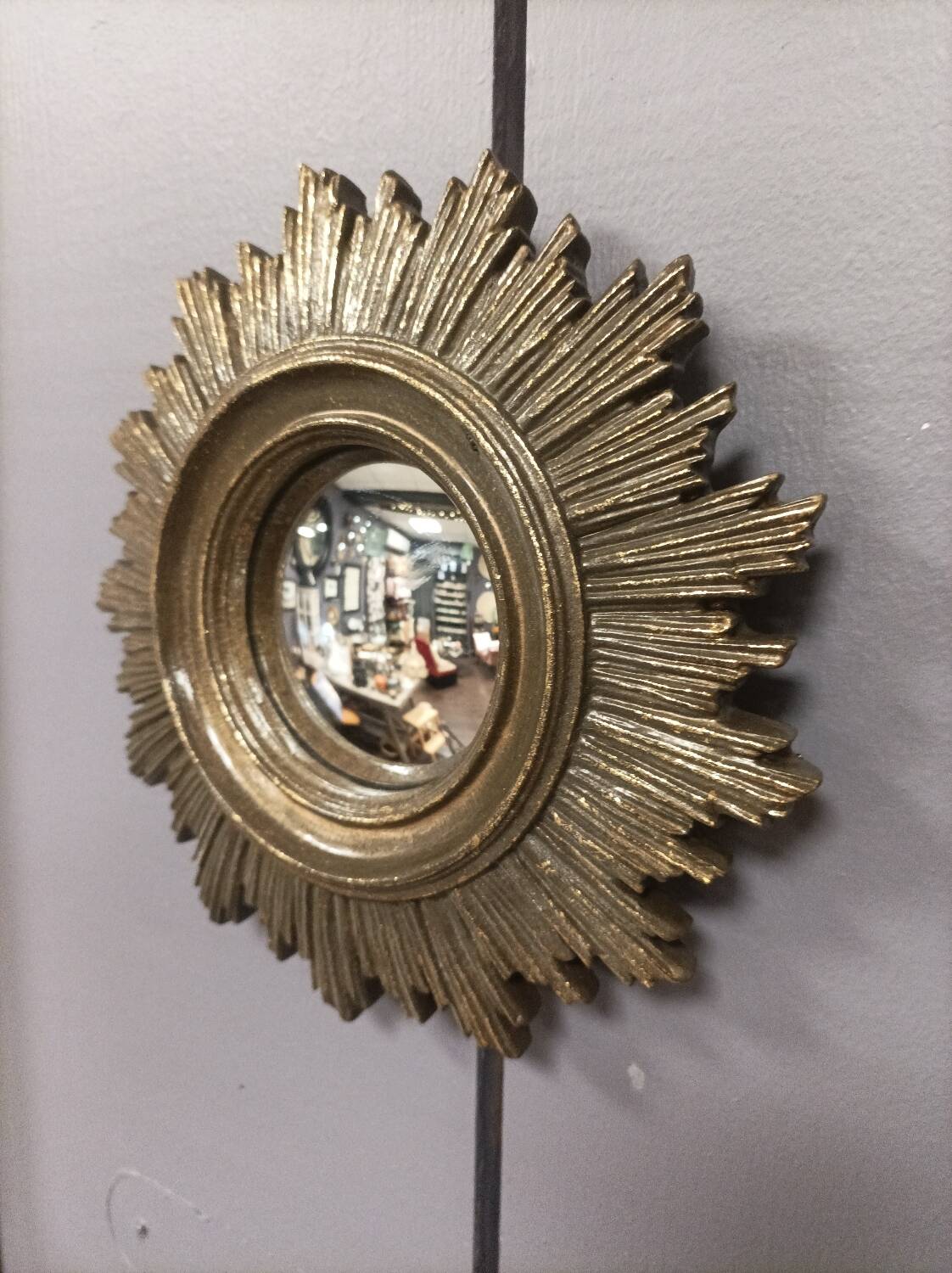 Antique golden sun convex mirror