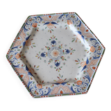 Ancient hexagonal plate in earthenware with polychrome floral decoration.