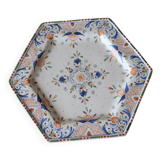 Ancient hexagonal plate in earthenware with polychrome floral decoration.