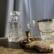 Small golden hand candlestick with a round loop handle D8 H6.5