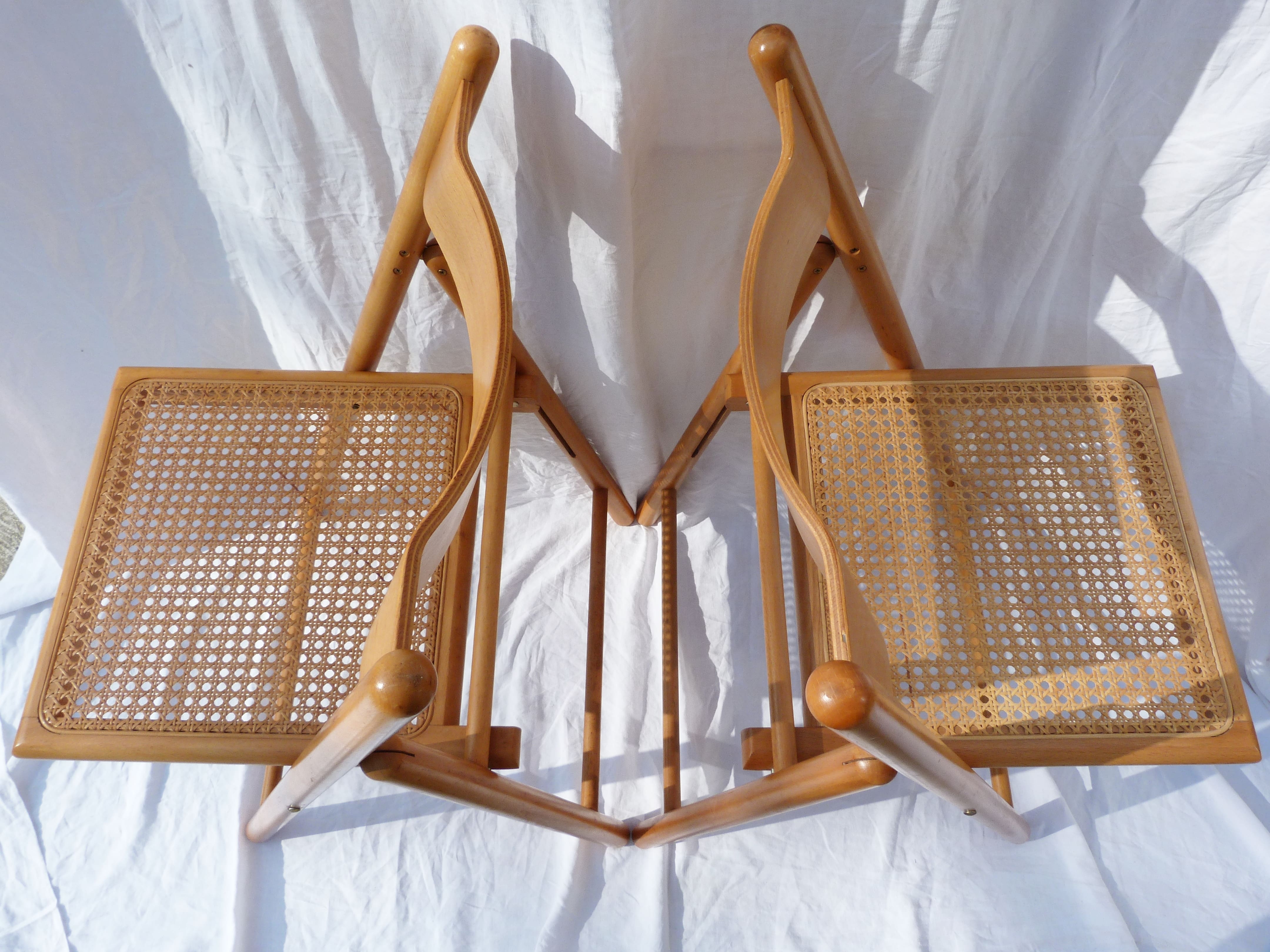 Duo of canned folding chairs