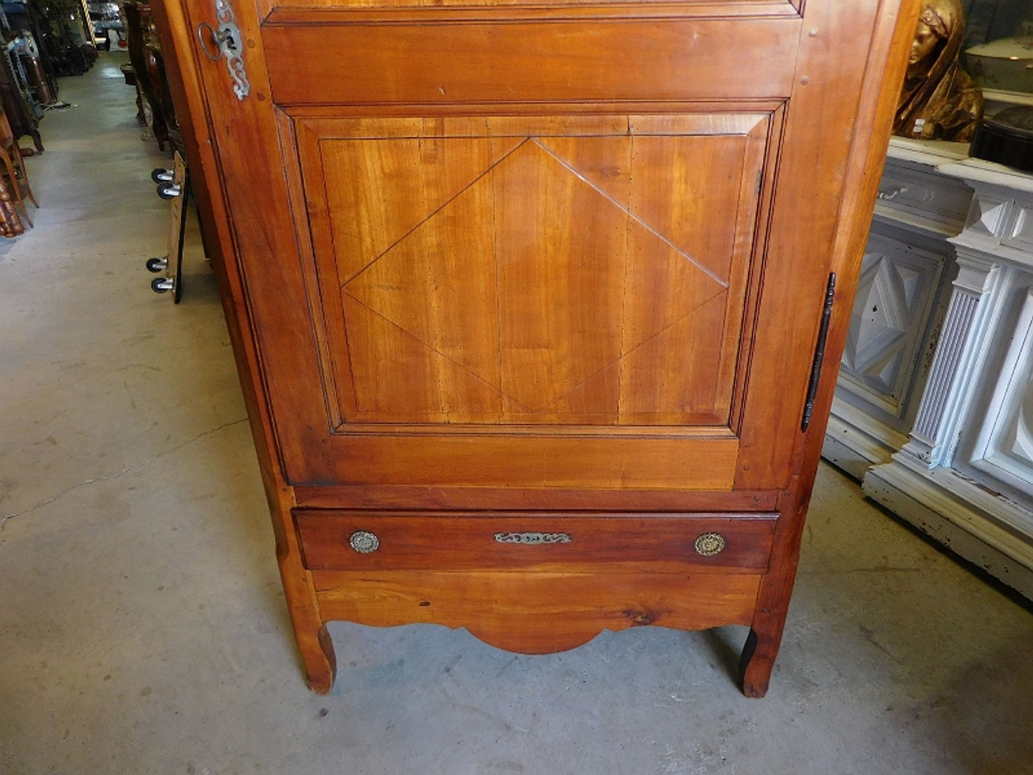 Bonnetiere in cherry 1 door 1 drawer of the xix century