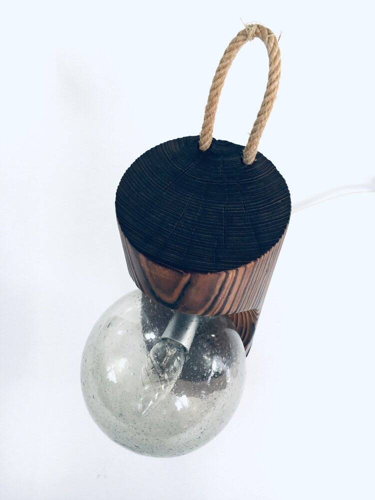 Brutalist wooden table or wall lamp attributed to Temde Leuchten, Switzerland, 1960s.