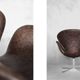 Brown leather Swan chair by Arne Jacobsen, mid-century Danish modernity.
