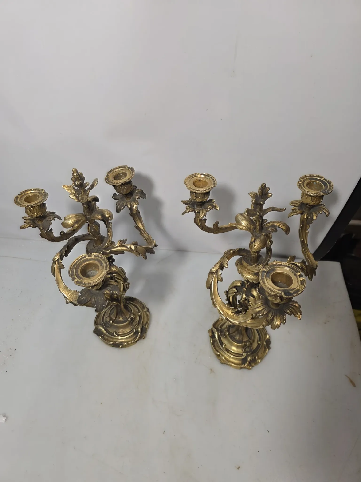 Pair of Louis XV style bronze candlesticks from the 19th century.
