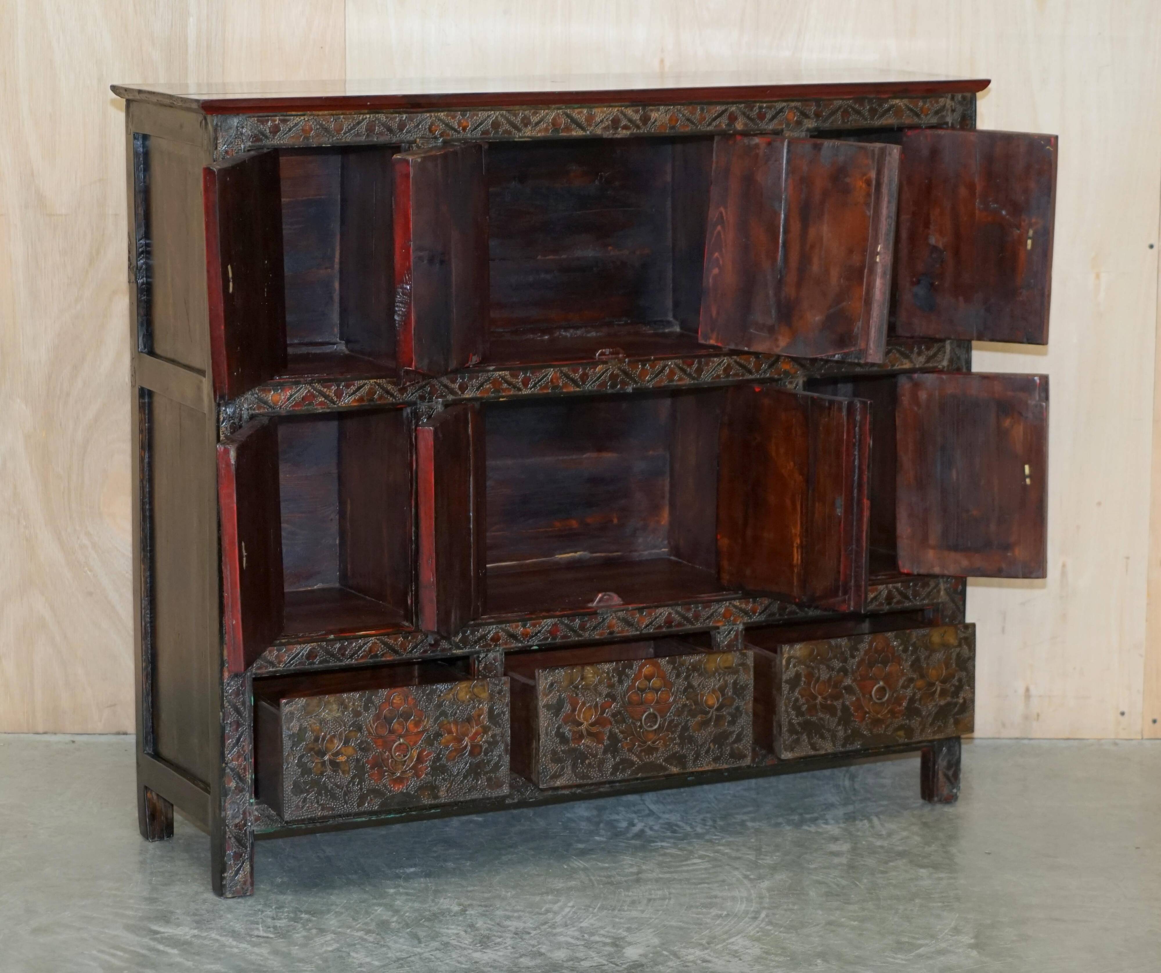 Antique polychrome Tibetan altar cabinet with deer and flowers.