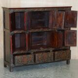 Antique polychrome Tibetan altar cabinet with deer and flowers.