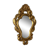 Golden mirror in baroque style.