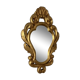 Golden mirror in baroque style.