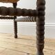 Turned wood corner chair