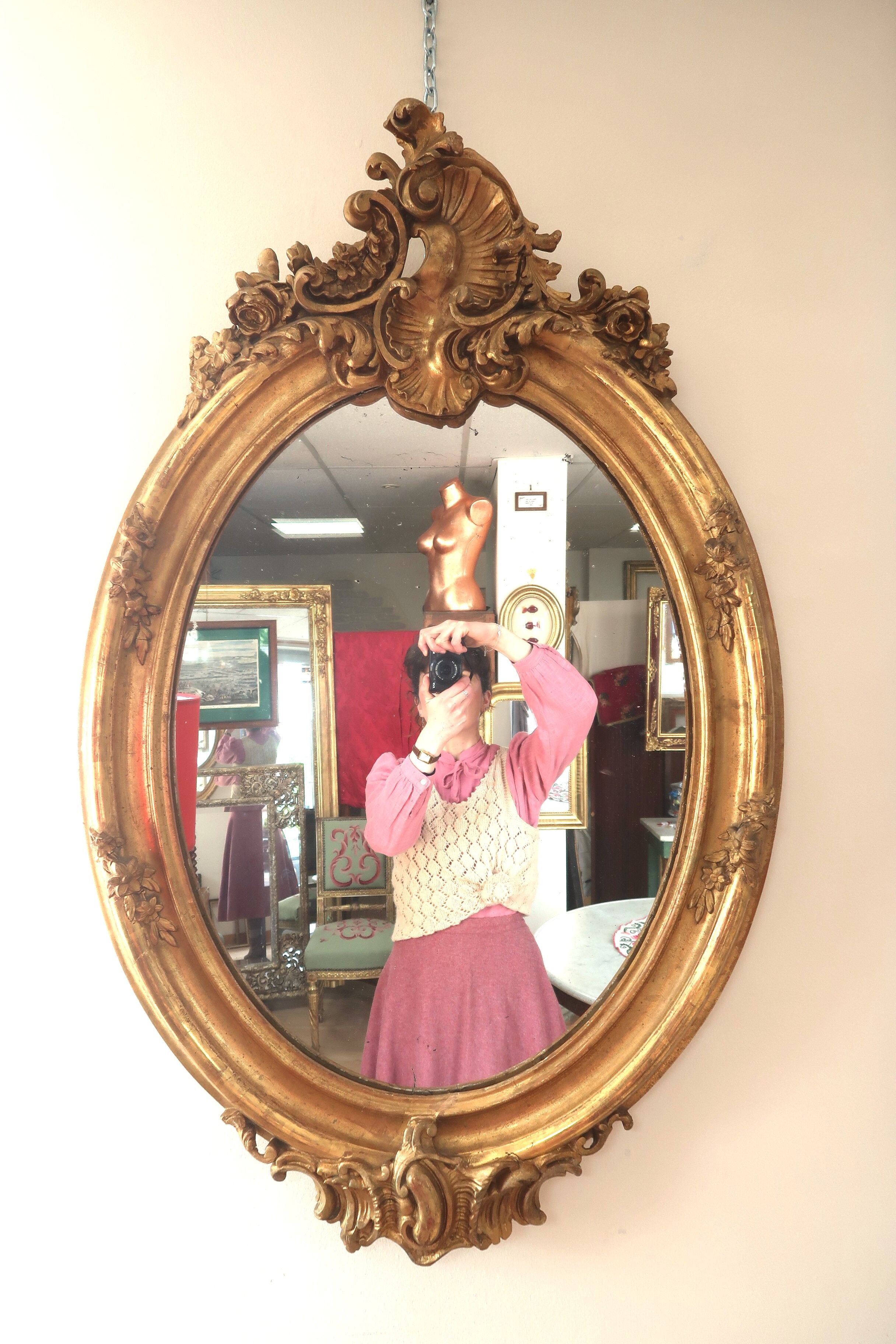 Oval mirror in gilded wood 98x63 cm