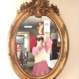 Miroir ovale en bois doré 98x63 cm