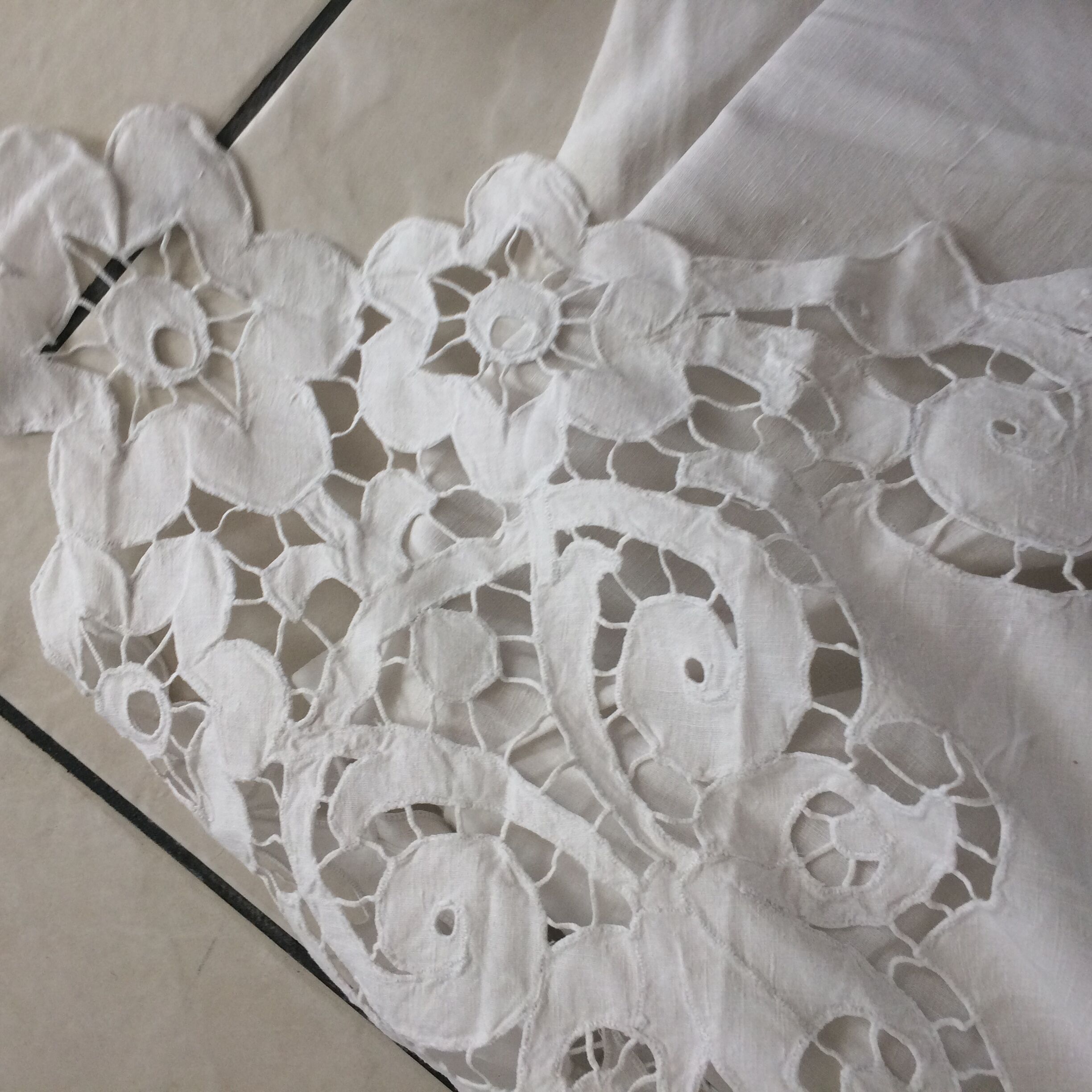 Old sheet with monograms and wide hand made embroider.