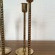 Series of 7 Scandinavian brass candlesticks