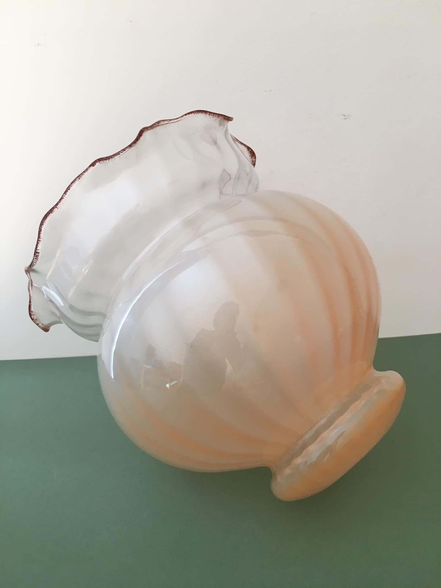 Peach-colored transparent glass collar globe