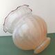 Peach-colored transparent glass collar globe