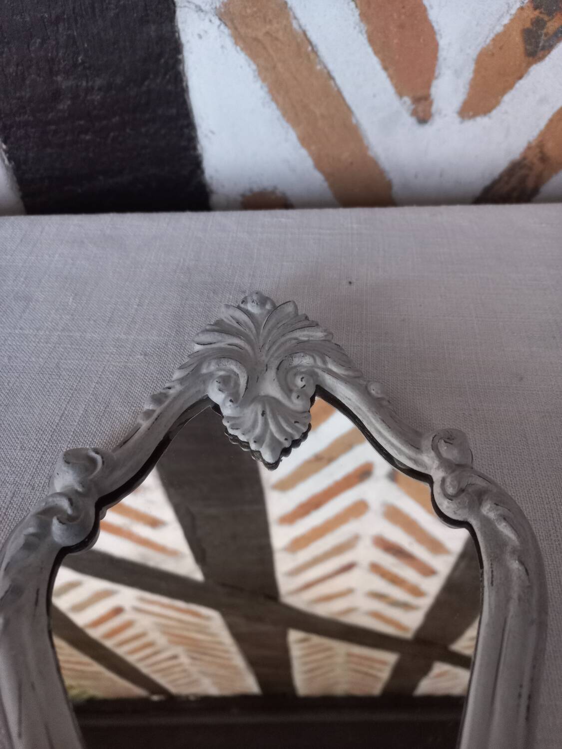 Small patinated baroque mirror