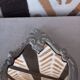 Small patinated baroque mirror