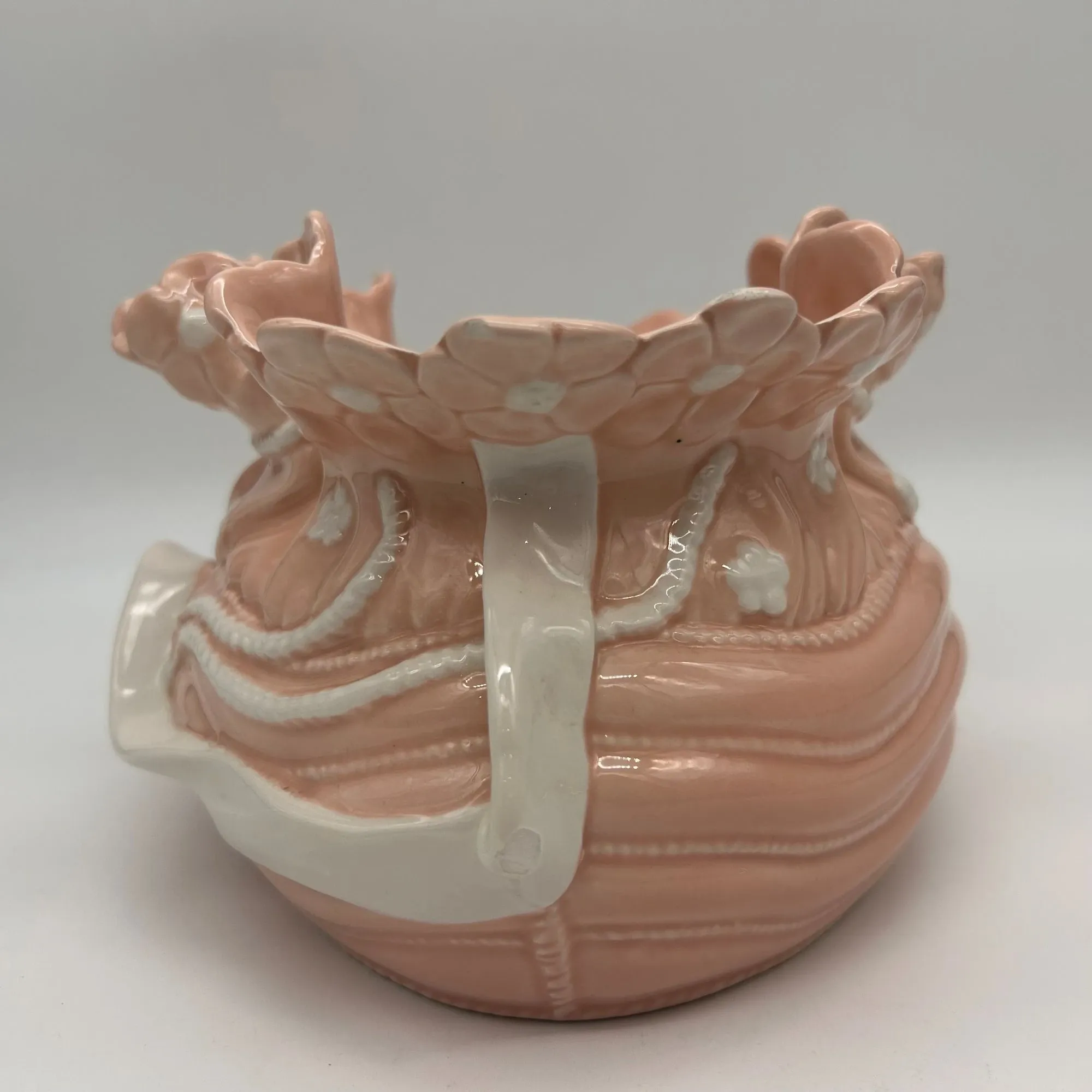 Vintage ceramic cache-pot in pink and white.